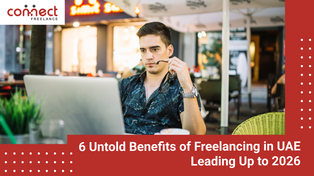 Digital nomad working on a laptop with the Dubai skyline background, highlighting the benefits of freelancing in UAE 2026.